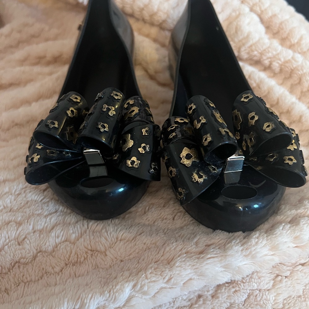 Mini Melissa Black and Gold Bow Flats